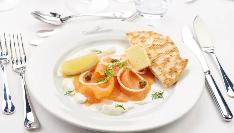 CroisiEurope appetizer smoked salmon from Scotland Highland and dill raifort cream and Nordic bread