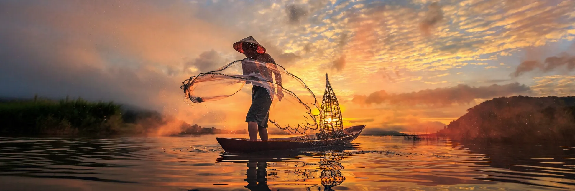 Un pécheur sur le Mékong au Vietnam 